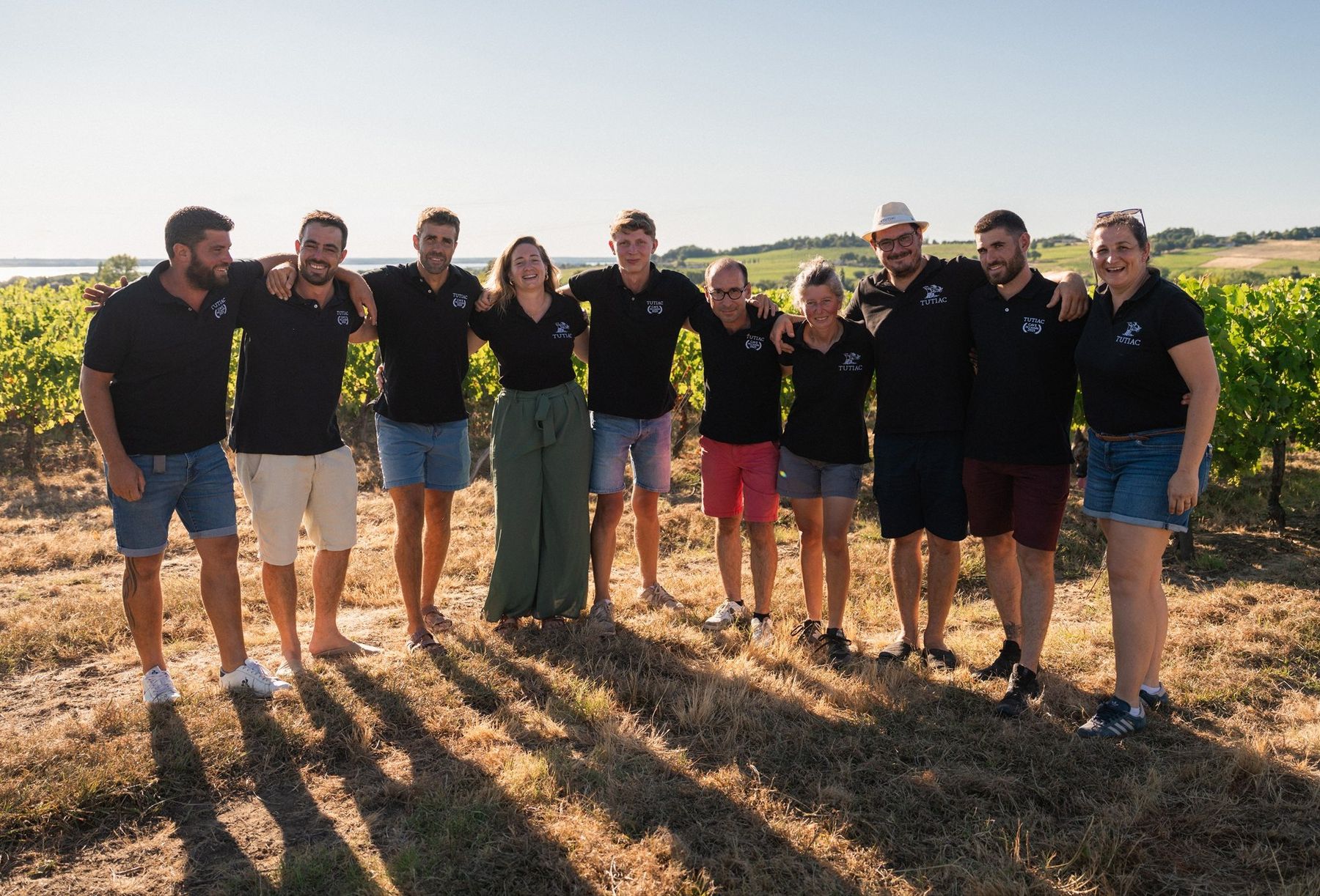 The Tutiac winegrowers together in a Bordeaux vineyard